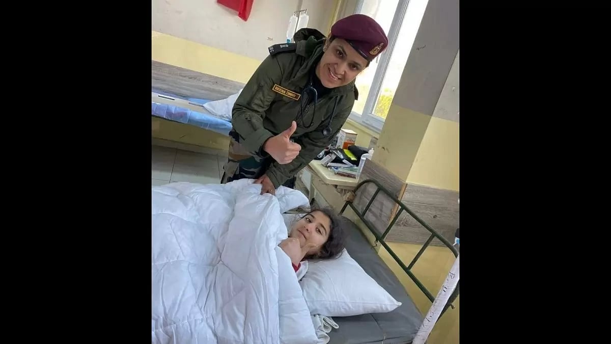 A girl recovering at an India-run hospital in Turkey with an Indian Army officer