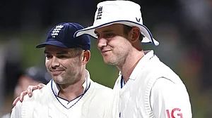 James Anderson, left, and Stuart Broad pose for a photo at the end of Day 3 on Saturday.