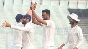 Unadkat, second right, registered figures of 6-85 in the second innings against Bengal.