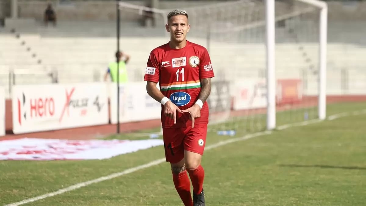 Sudeva Delhi's Alexis Gomez celebrates after scoring against TRAU FC on Wednesday.