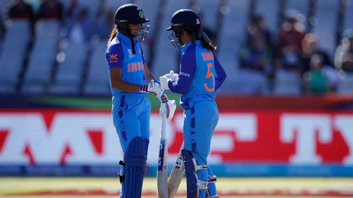 Harmanpreert, left, and Rodrigues brought up their 50-run partnership.