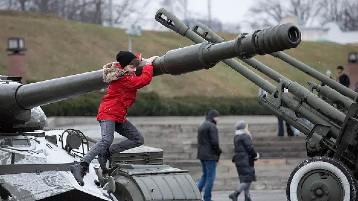 January 2023: Parents & children visit an exhibition of military equipment in central Kyiv, Ukraine