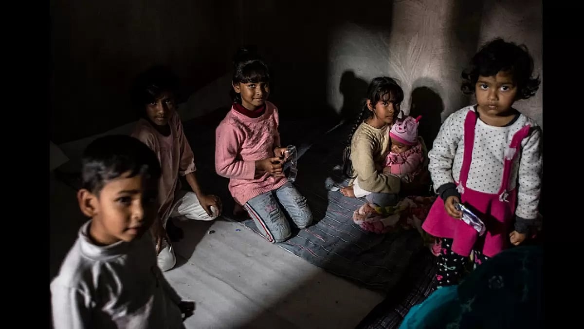 Displaced children from north east Delhi neighborhoods at a shelter camp following the violence.