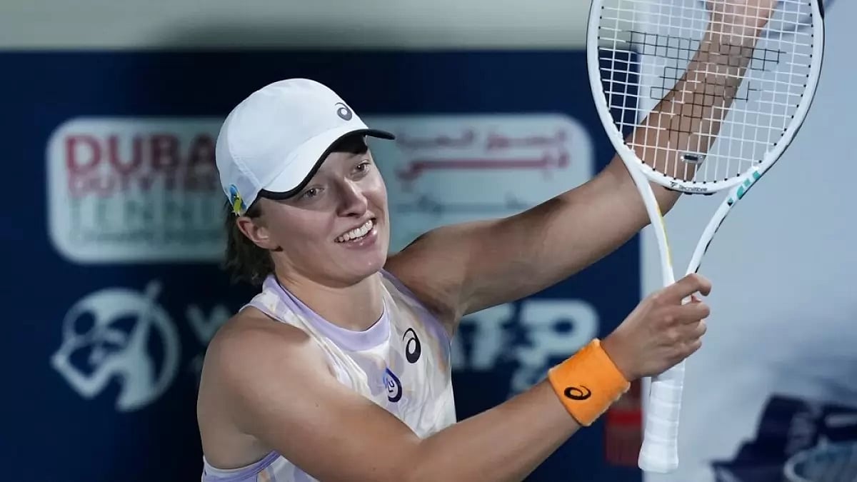 Swiatek celebrates after her win over Gauff in Dubai on Friday.