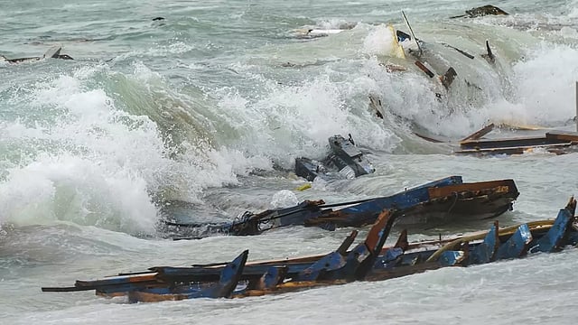 In Pics: Migrant Boat Capsizes Near Italy Beach