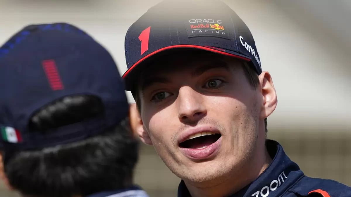 Verstappen pictured with teammate Sergio Perez during pre-season testing in Bahrain.