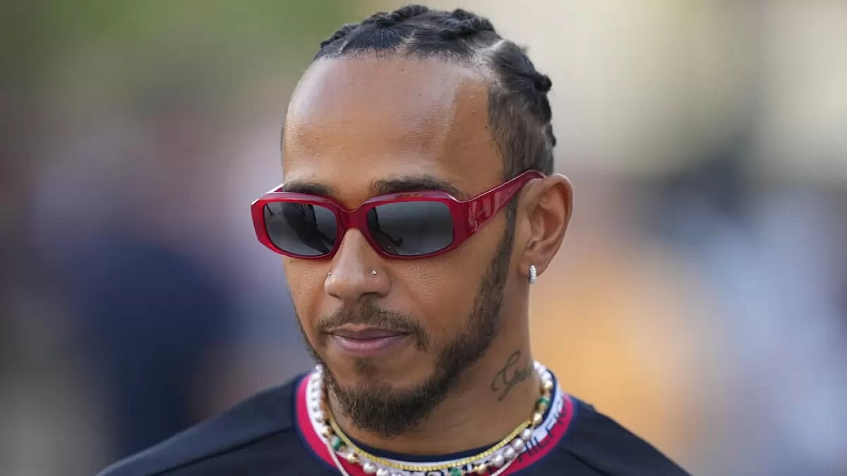Lewis Hamilton arrives for an interview in Bahrain on Thursday.