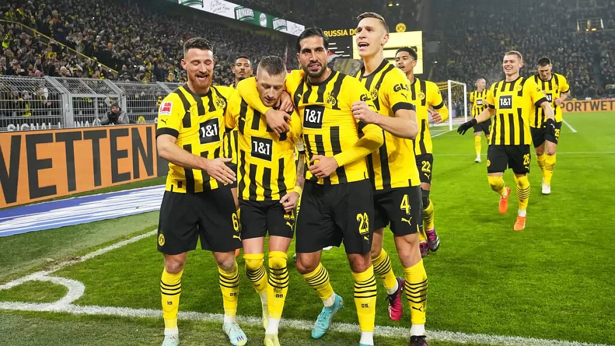 Dortmund players celebrate their team's first goal against Leipzig on Friday.