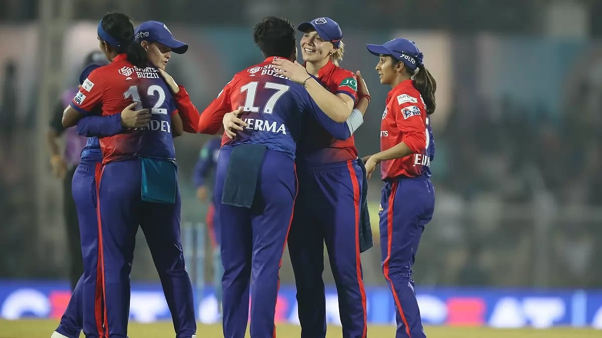 DC players celebrate after their win over RCB on Sunday.