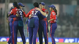 DC players celebrate after their win over RCB on Sunday.