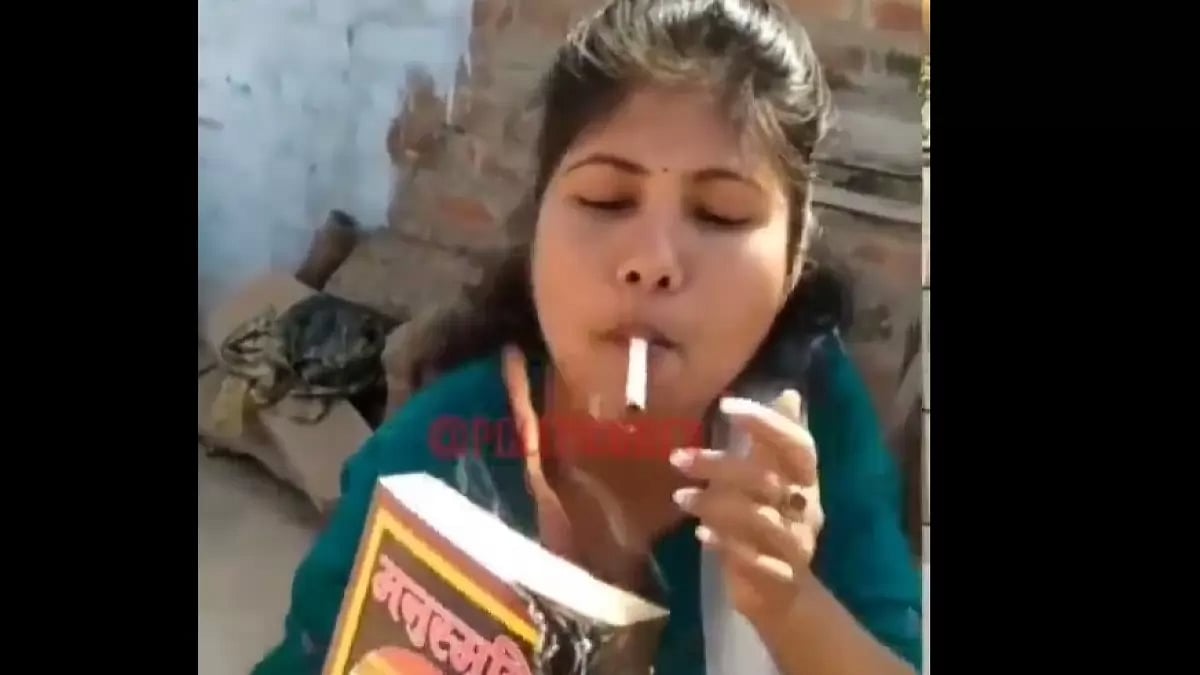 Woman burns Manusmriti