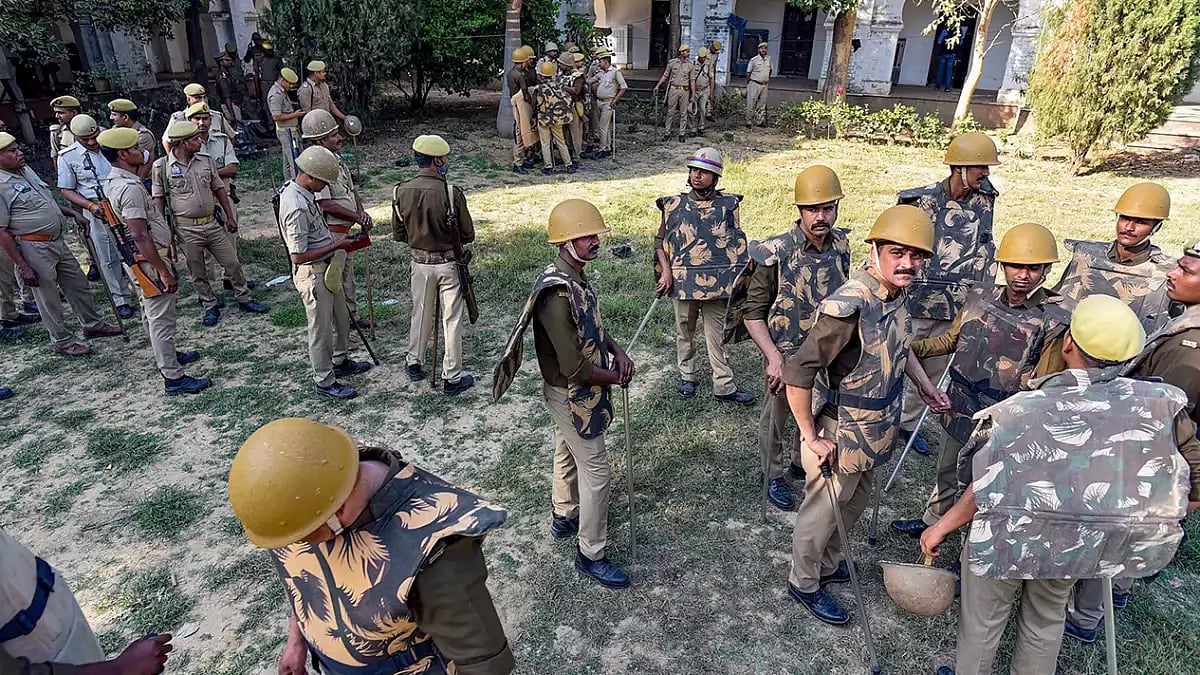 UP Police personnel during a raid at Allahabad University