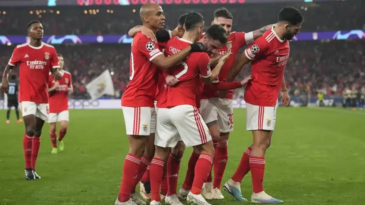 Benfica's players celebrate after scoring their side's opening goal during the UCL game vs Brugge.