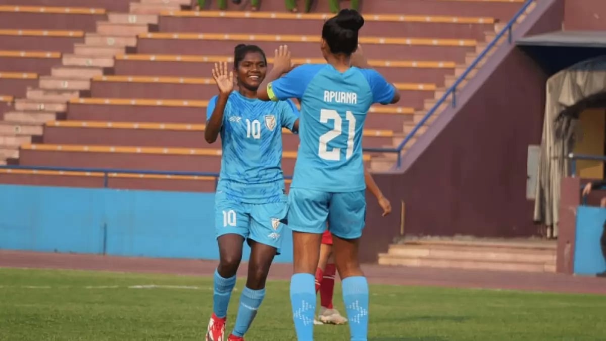 Sumati Kumari, left, celebrates with Apurna Narzary during their match on Thursday.