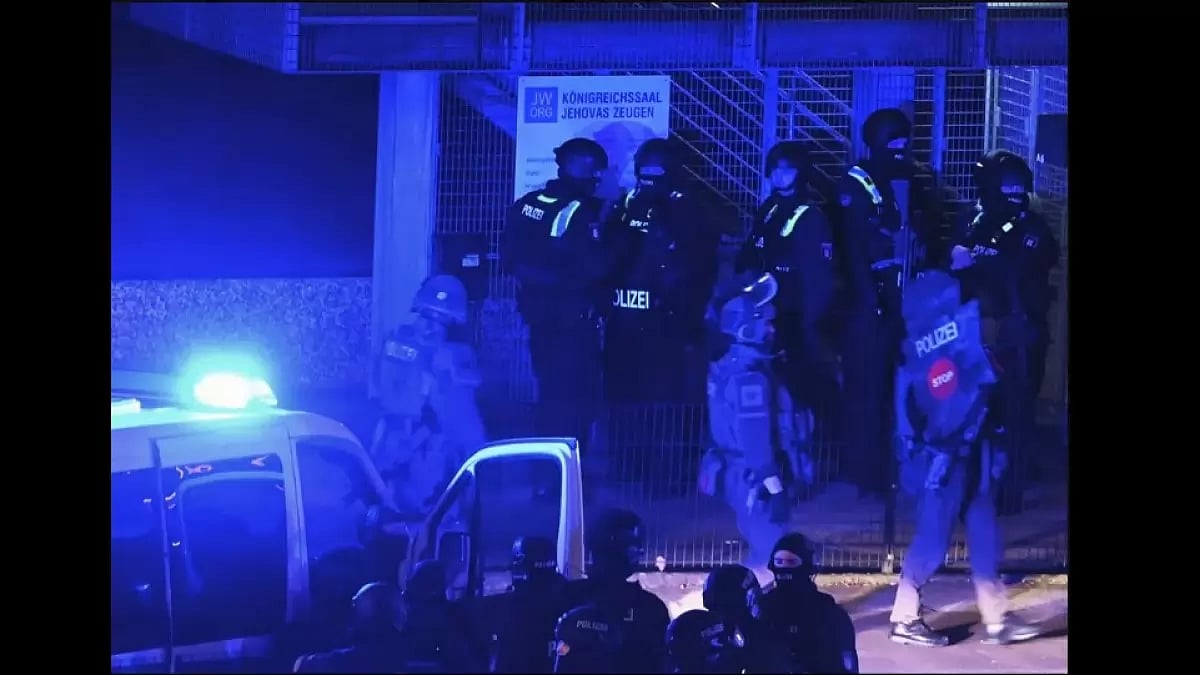 Police gather outside the shooting area in Germany.