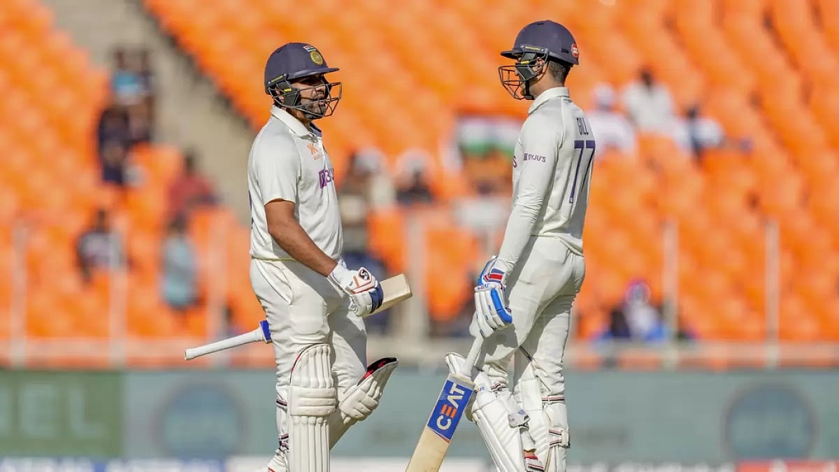 Rohit Sharma, left, and Shubman Gill chat during India's batting on Friday.