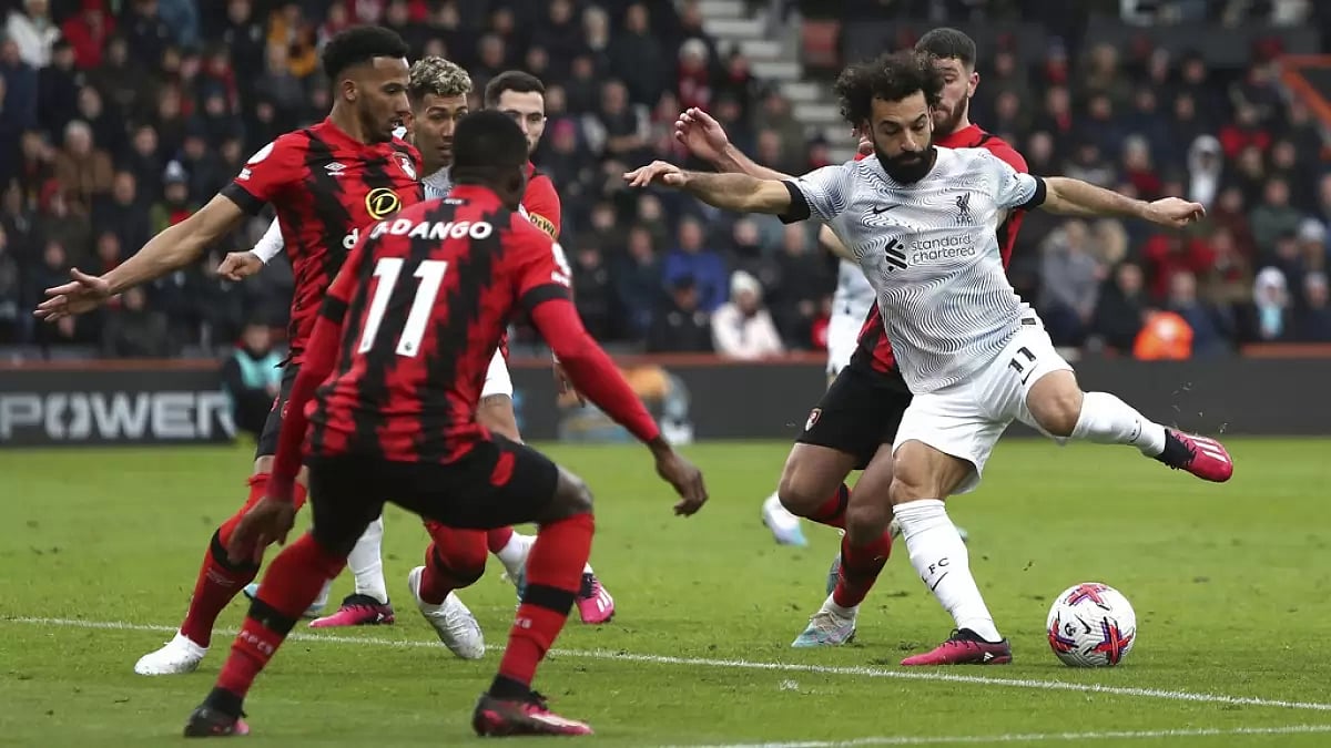 Salah, right, attempts a shot against Bournemouth on Saturday.