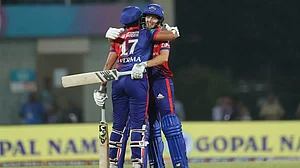 Shafali Verma and Meg Lanning celebrate DC's win over GG on Saturday.