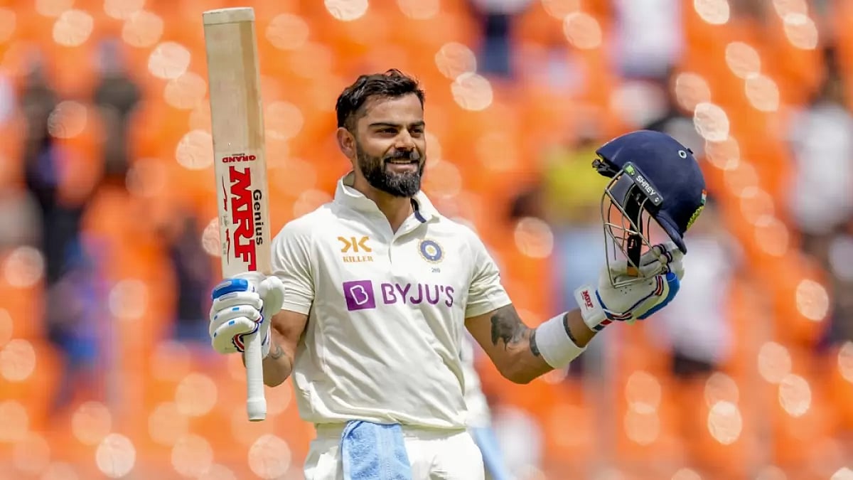 Kohli celebrates after reaching his century on Day 4 of the 4th Test on Sunday.