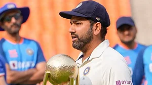 Rohit Sharma holds the Border-Gavaskar trophy after winning the series 2-1.