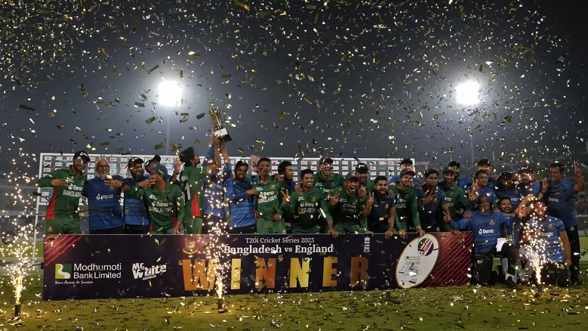 Bangladesh players celebrate with the winners trophy after claiming the series 3-0.