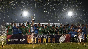 Bangladesh players celebrate with the winners trophy after claiming the series 3-0.