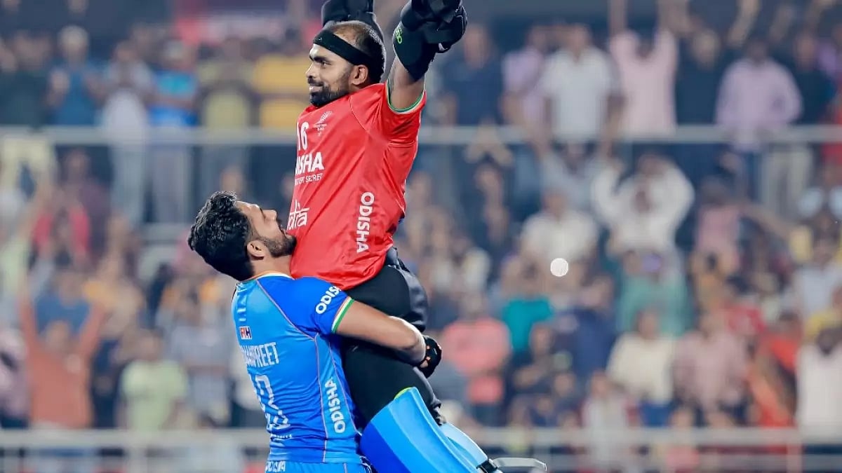 Harmanpreet Singh lifts PR Sreejesh after India's win over Australia on Wednesday.