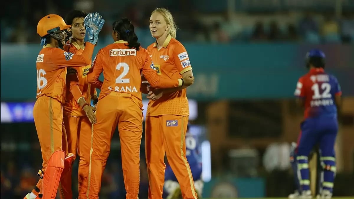 Gujarat Giants players celebrate the wicket of Meg Lanning on Thursday.