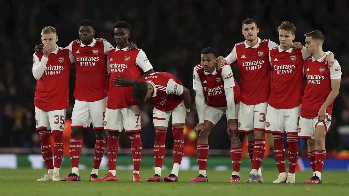 Arsenal players react after their ouster from the Europa League on Thursday.