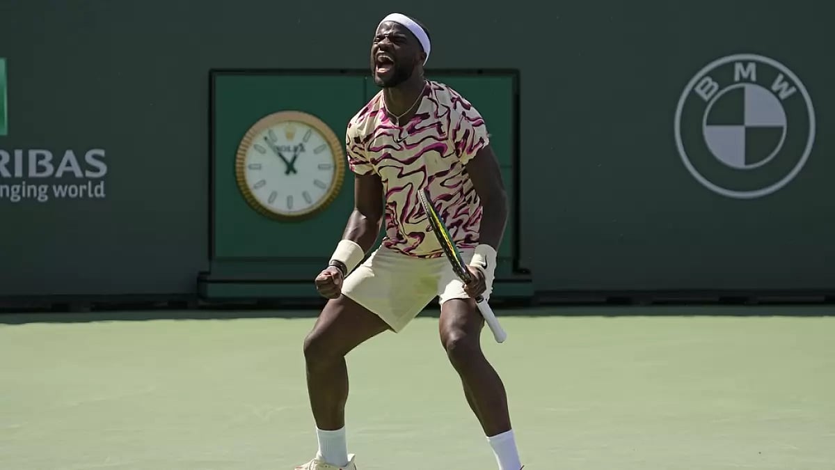 Tiafoe celebrates after his winning point against Norrie on Thursday.