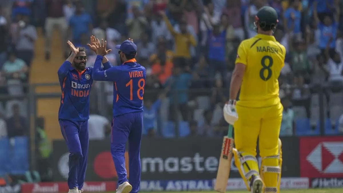 Jadeja and Kohli celebrate the wicket of Mitchell Marsh in Mumbai on Friday.