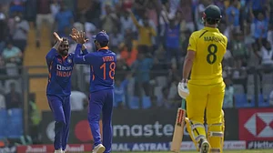 Jadeja and Kohli celebrate the wicket of Mitchell Marsh in Mumbai on Friday.
