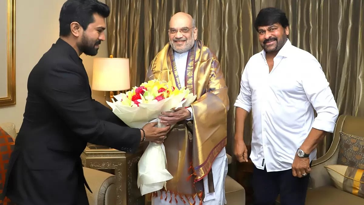 Union Home Minister Amit Shah with veteran actor Chiranjeevi and his son.