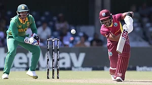 Shai Hope bats during his 128-run inning against South Africa at Buffalo Park on Saturday.