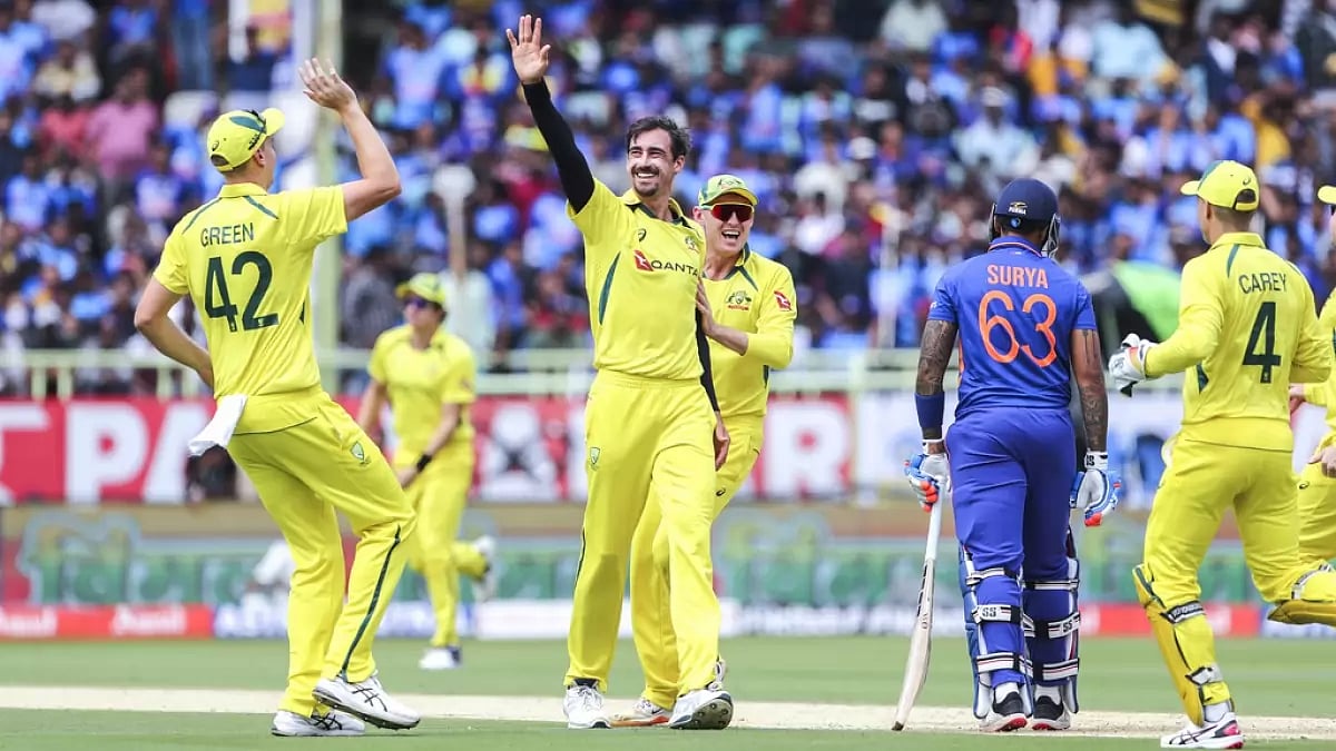 Mitchell Starc, centre, celebrates the wicket of Suryakumar Yadav in Visakhapatnam on Sunday.