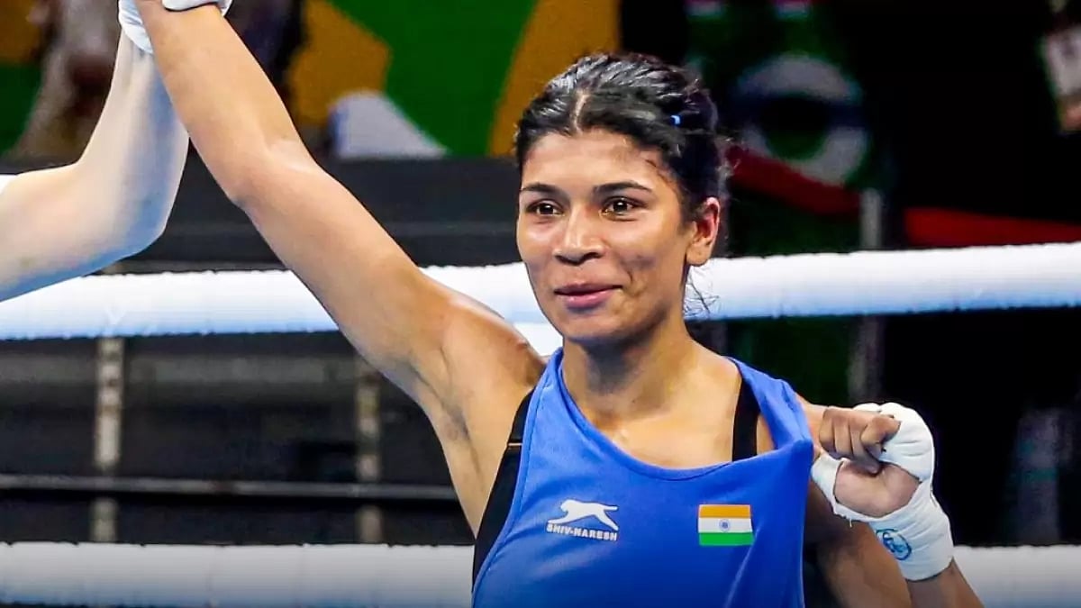 Nikhat has her hand raised after her 2nd round win on Sunday.