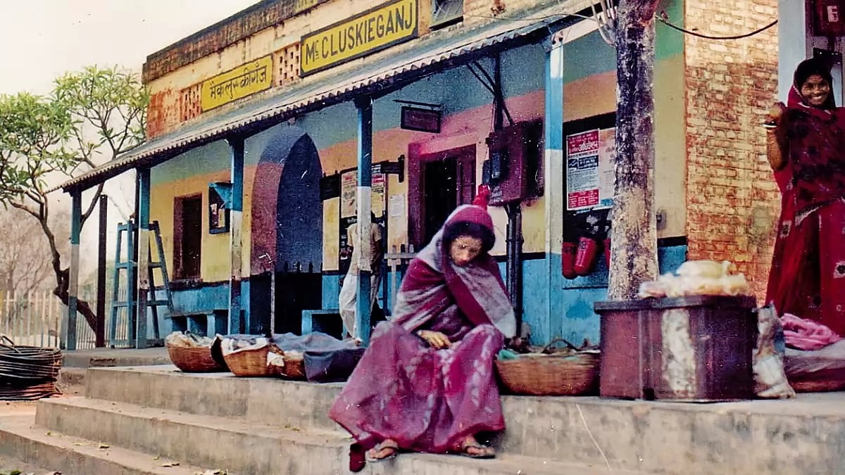 A Second Home: A photo of Kitty Texeira, an Anglo-Indian woman living in McCluskieganj, selling fruits at the railway station taken in 2010