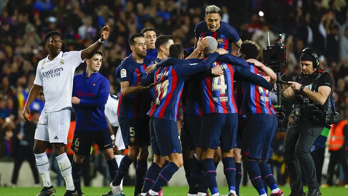 Barcelona players celebrate their win over Real Madrid at Camp Nou on Sunday.