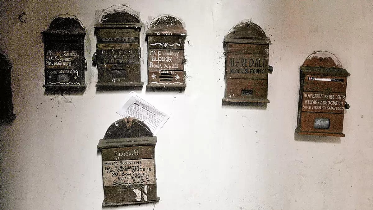 Yours Truly: Letter boxes of Anglo-Indian inhabitants adorn the wall of a building in Bow Barracks, Kolkata