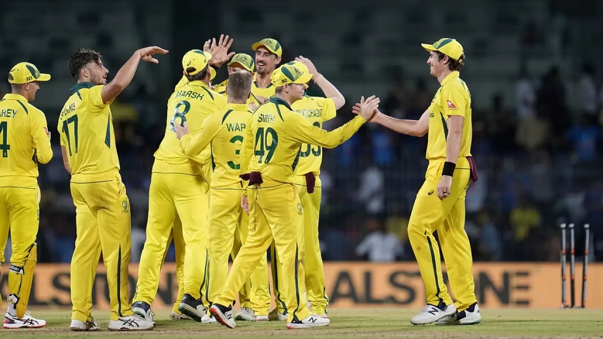 Australian players celebrate their win over India in Chennai on Wednesday.