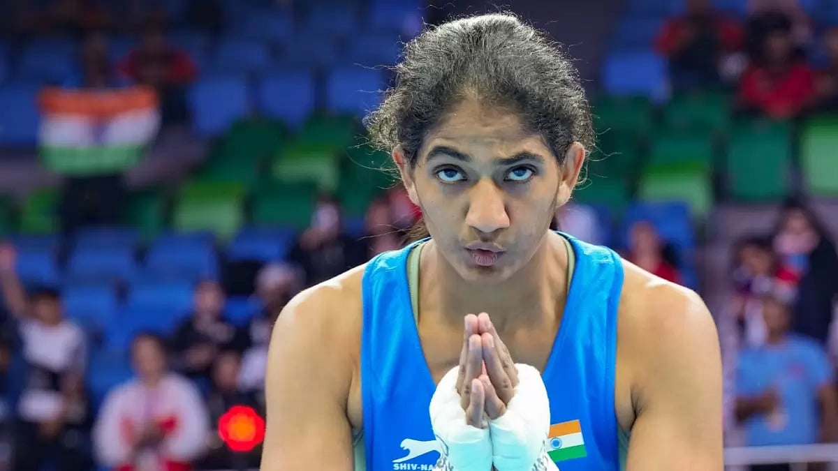 Nitu Ghanghas acknowledges the crowd in New Delhi after her semifinals win on Thursday.