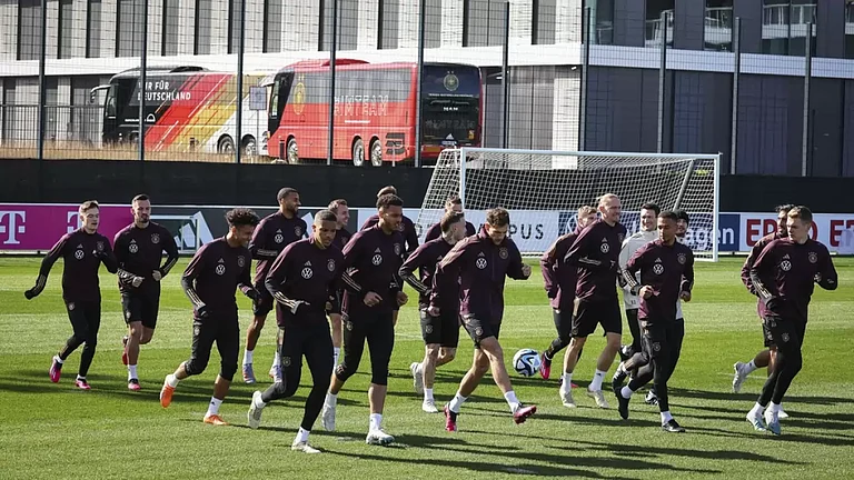 Germany national football team players warm up - AP
