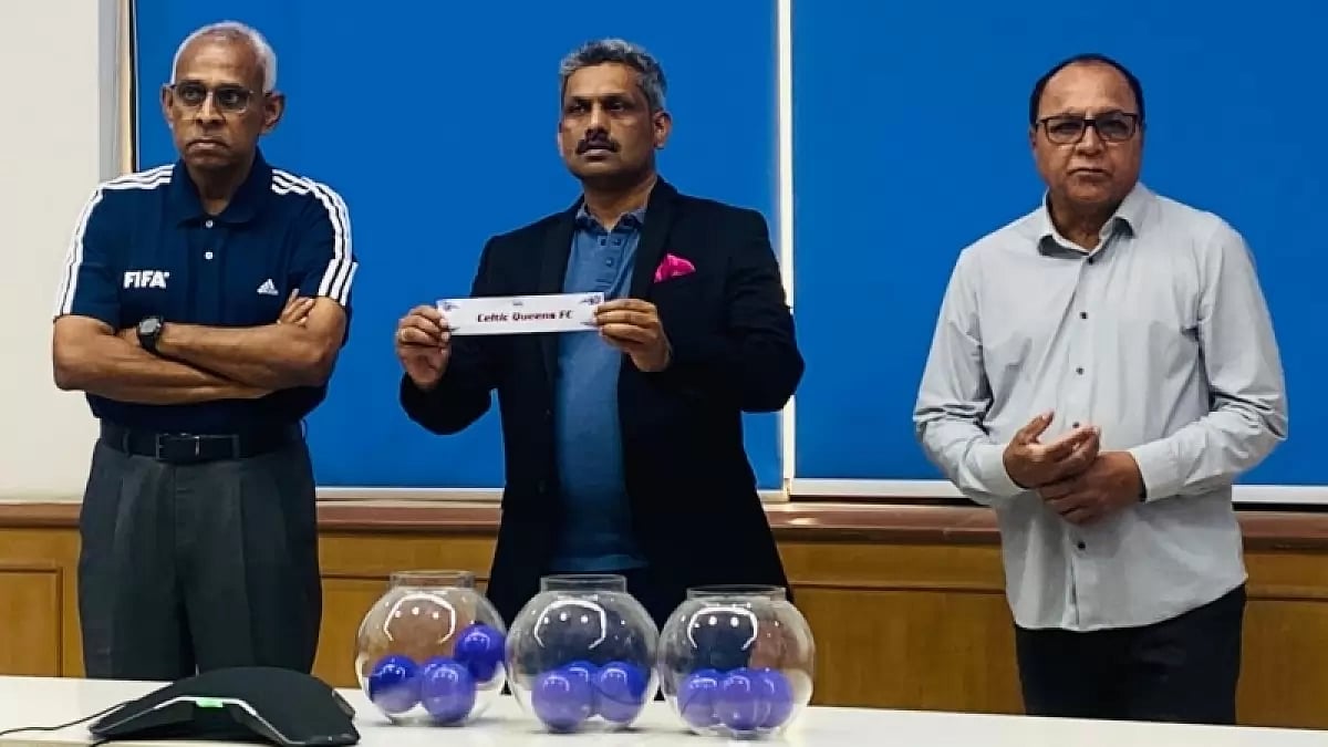Shaji Prabhakaran, centre, unveils groupings at the draw on Thursday.