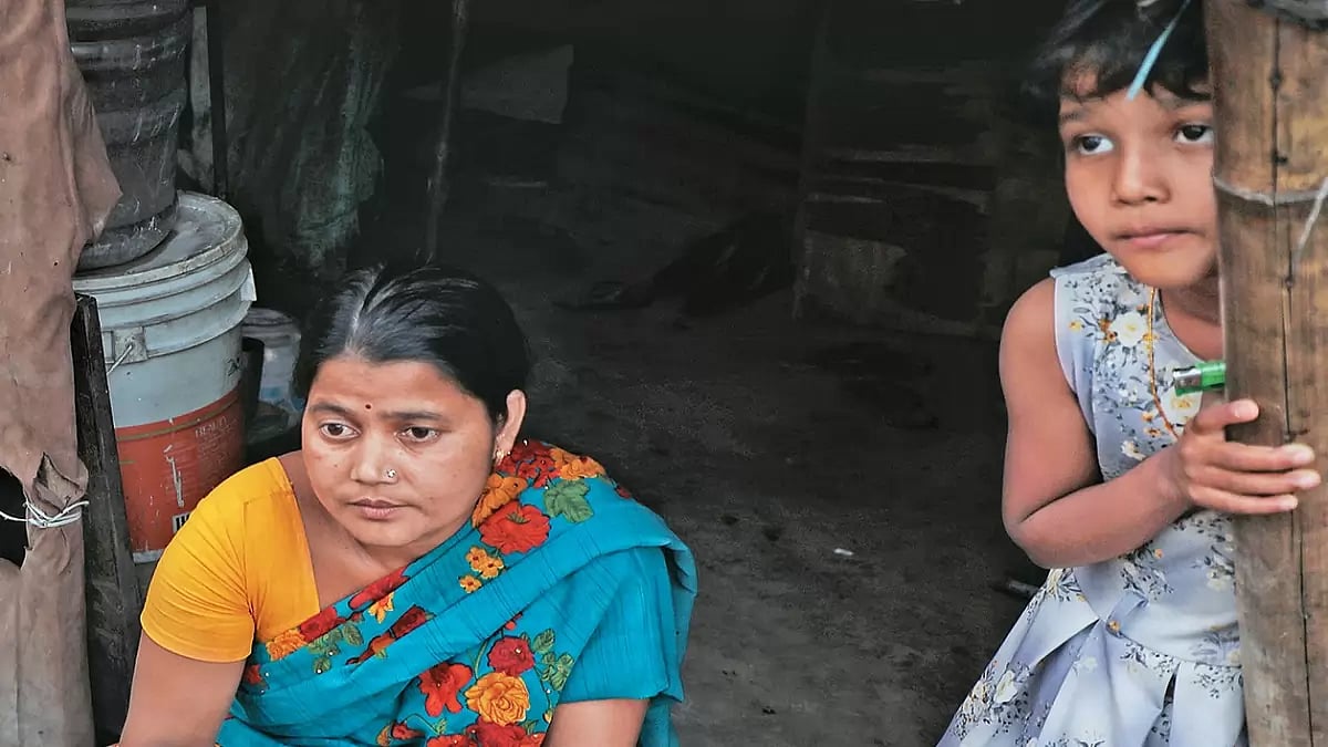 Struggling To get By: Banani, a domestic worker from Bengal, in her shanty in Sangam Vihar, Delhi
