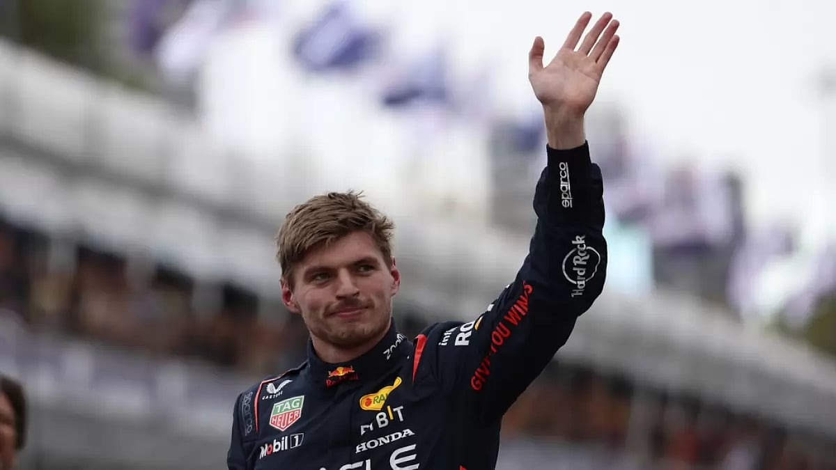 Verstappen waves to the crowd after securing pole position in Melbourne on Saturday.