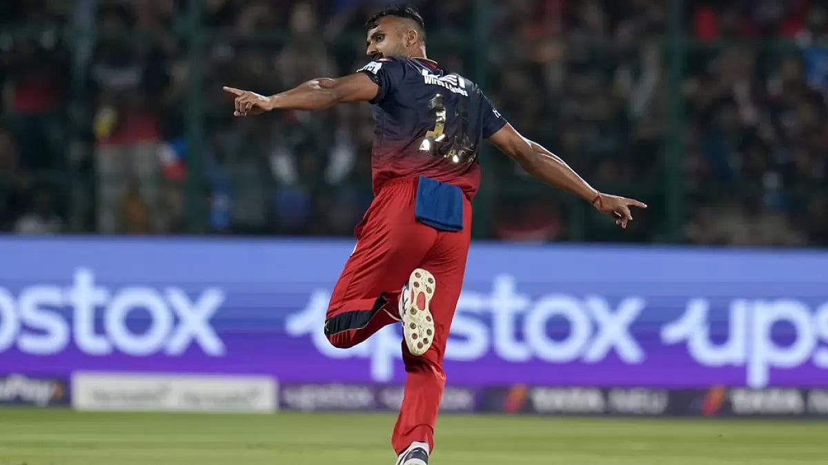 Akash Deep celebrates the wicket of MI's Rohit Sharma on Sunday.