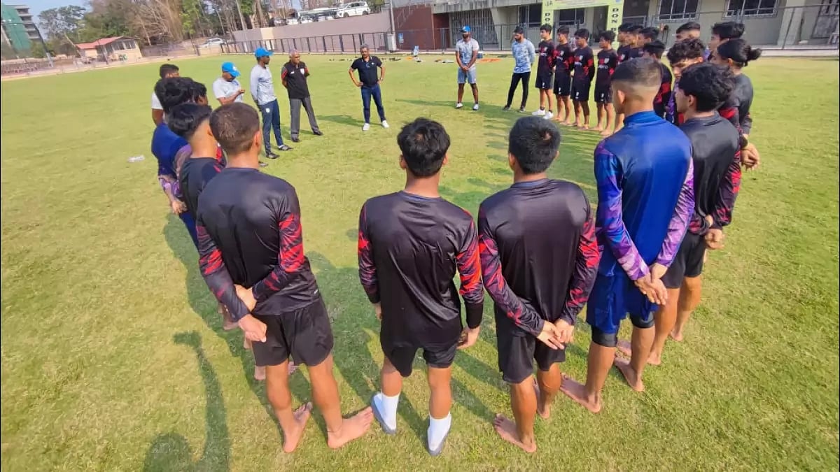 Shaji Prabhakaran speaks with the Indian U-17 players in Goa on Saturday.