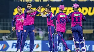 Ashwin celebrates the wicket of Ajinkya Rahane with Chahal in Chennai on Wednesday.