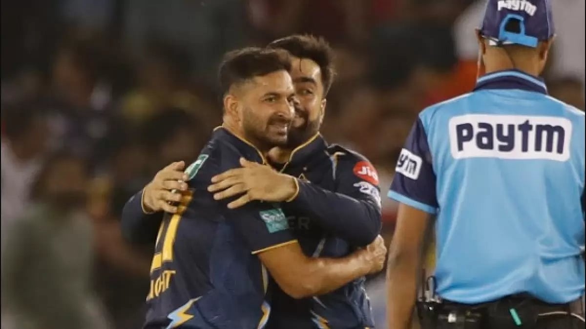 Mohit Sharma celebrates the wicket of Jitesh Sharma in Mohali on Thursday.