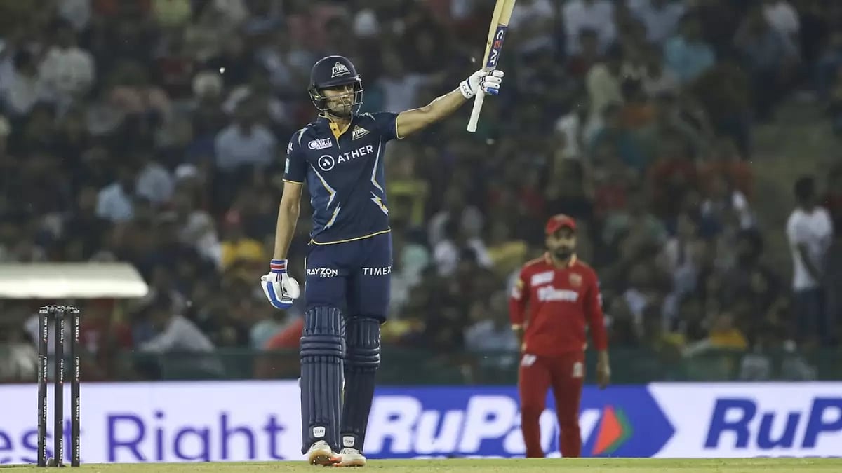 Gill celebrates after reaching his fifty against PBKS in Mohali on Thursday.